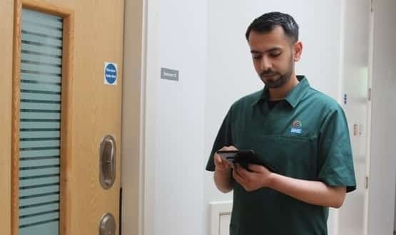 A nurse at Birmingham and Solihull using the new Digital Warn mobile app