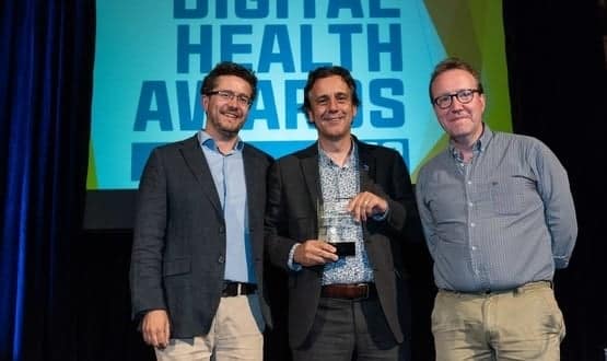 Andy Kinnear collects his award for outstanding contribution at the 2018 Digital Health Summer Schools