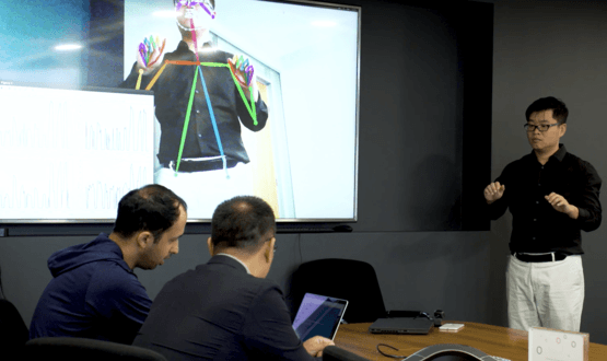 Dr. Wei Fan of Tencent and Dan Vahdat of Medopad conduct a demo of their Parkinson's assessment AI