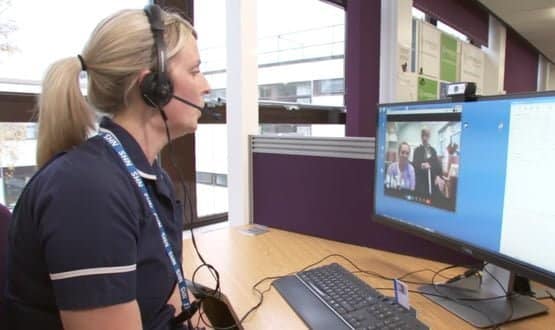 A nurse at Airedale NHS Foundation Trust speaking to a care home resident via Immedicare's telemedicine service