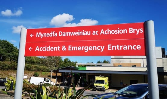A sign for the A&E department at a hospital in Wales