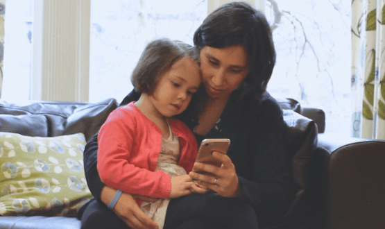 A mother and daughter explore the Little Journey app
