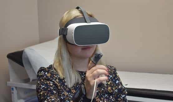 A woman using a virtual reality headset used by North Lincolnshire COPD patients