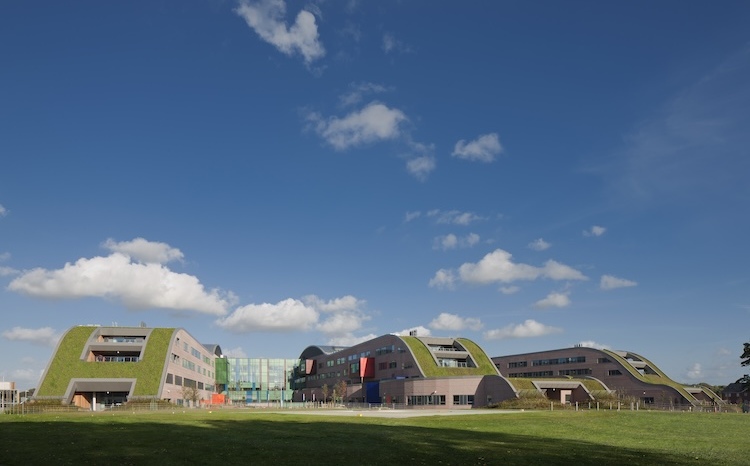 A photo showing the exterior facade of Alder Hey Children's Hospital. under a blue sky